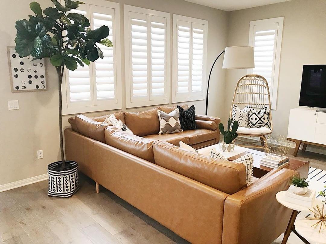 Cozy living room with our Polywood shutters in San Diego.